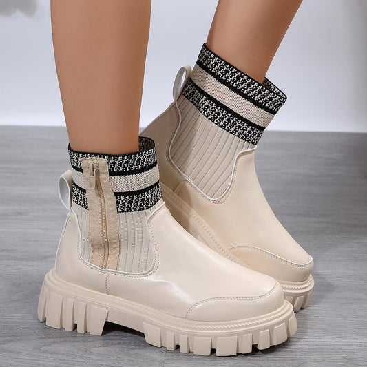 White chunky boots with patterned socks on a neutral background