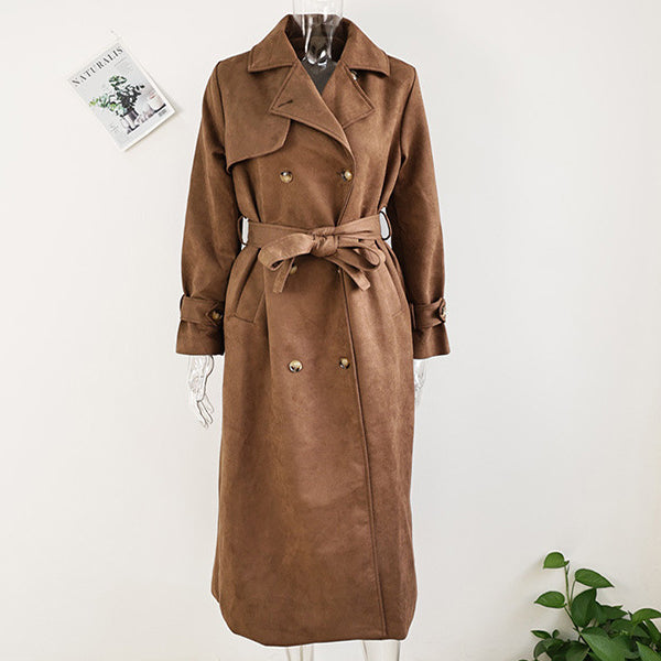 Brown trench coat on a mannequin against a white background by Millivan 