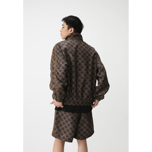 Person wearing a patterned outfit on a white background