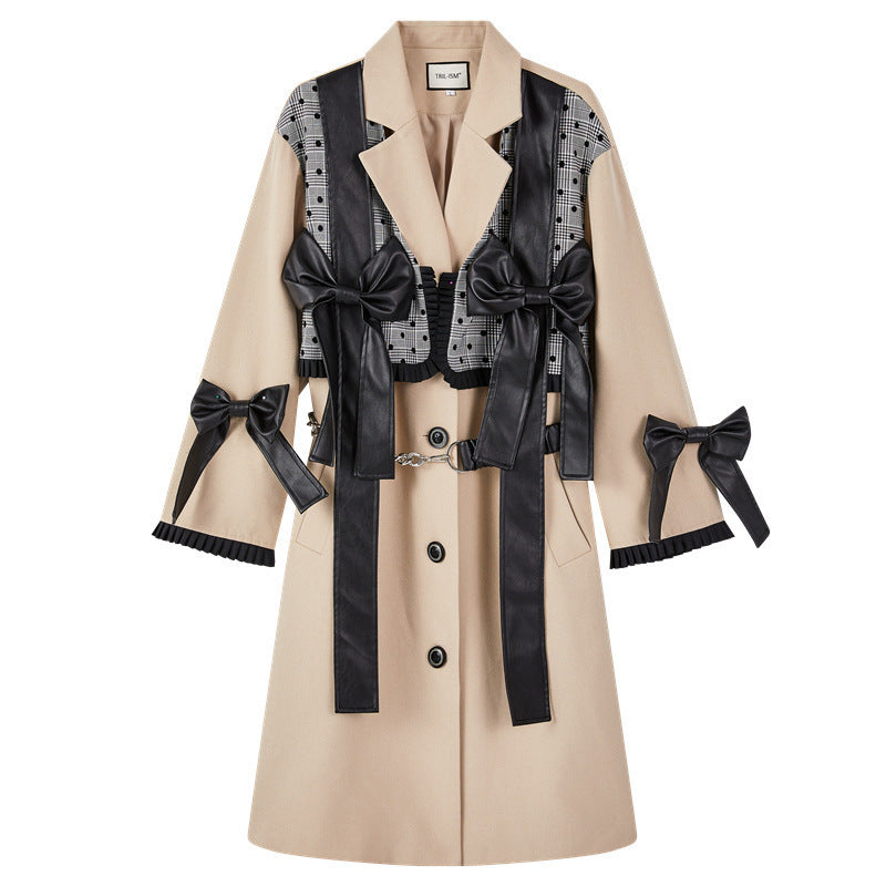 Beige trench coat with black ribbon details on a white background by millivan