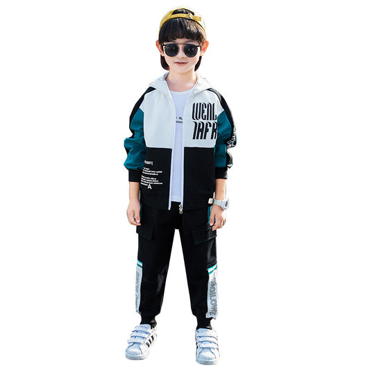 Child wearing a stylish outfit with a jacket and pants on a white background