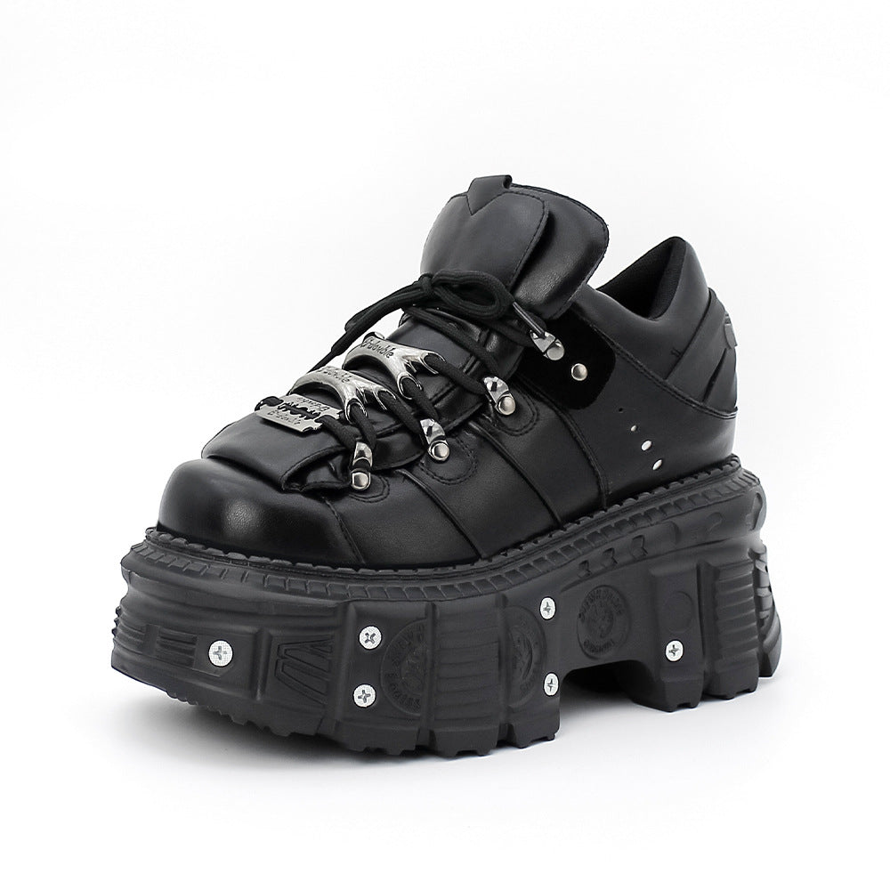 Black platform sneaker with chunky sole on a white background