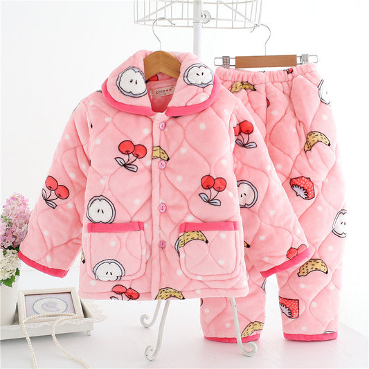 Pink children's pajama set with cartoon designs on a white background