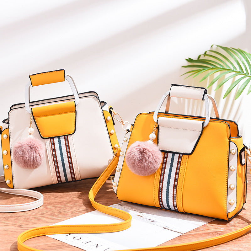 Luxury fashion handbag for women in [color] - stylish, durable designer bag with multiple compartments, adjustable shoulder strap, and water-resistant lining - premium quality polyester handbag - Millivan Supplies"
