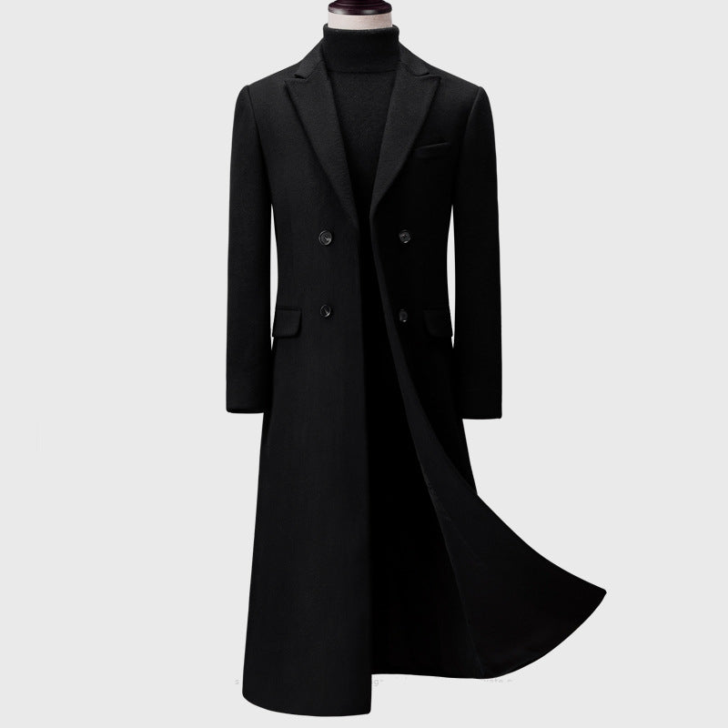 Black coat on a mannequin against a white background