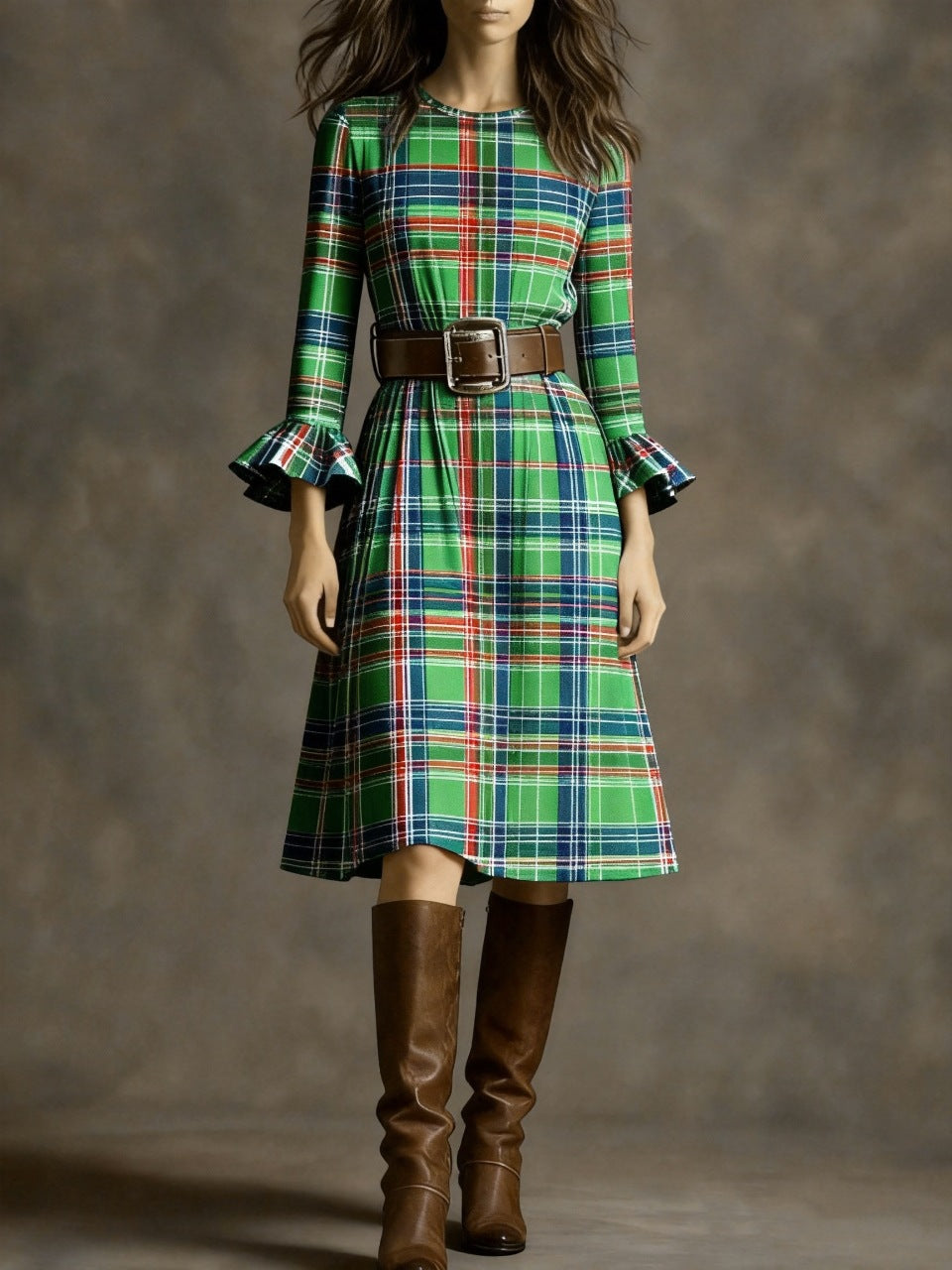 Green plaid dress with brown belt and boots on a neutral background by millivan
