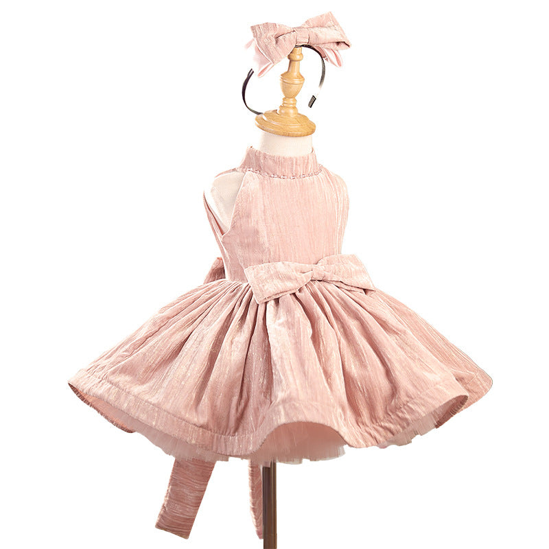 Pink dress on a mannequin with a white background