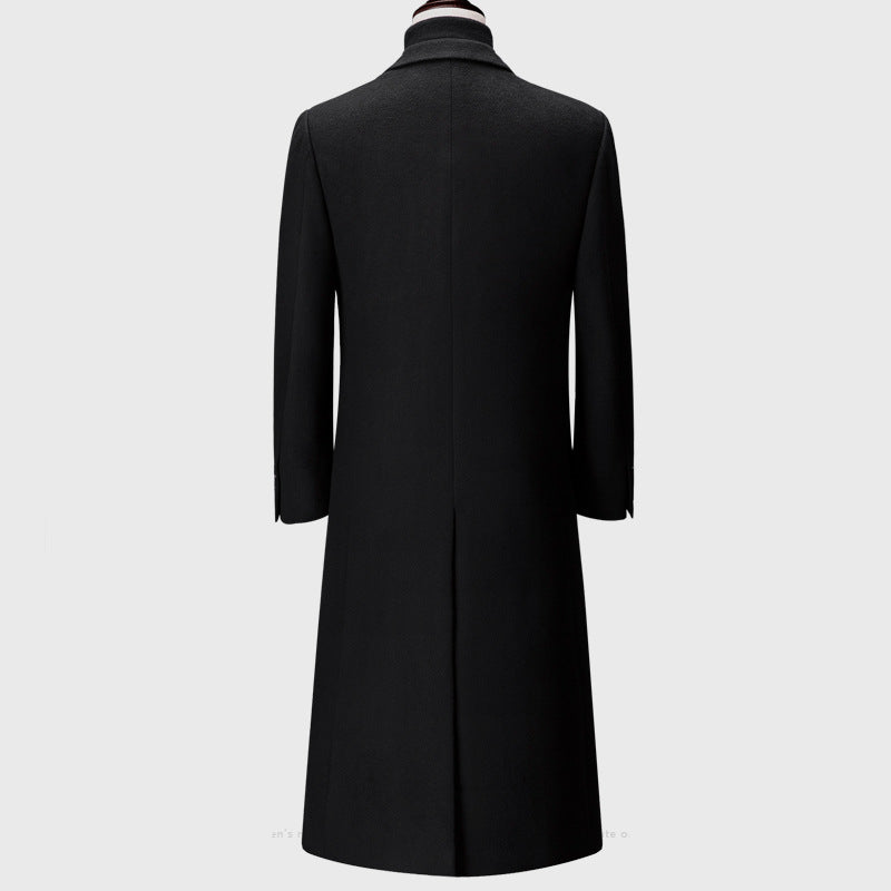 Black coat on a mannequin against a white background