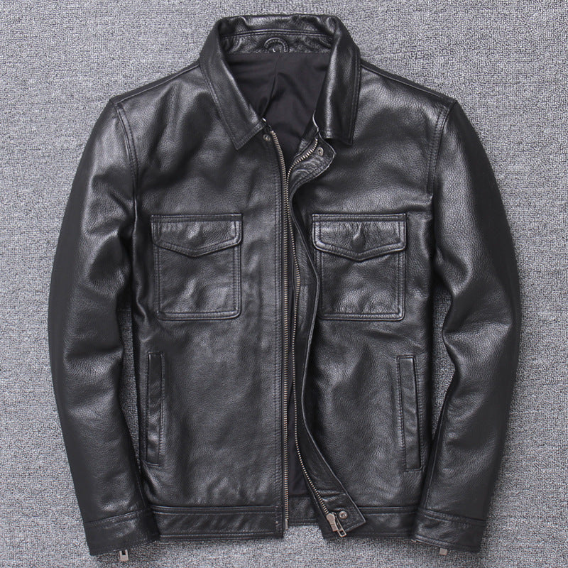 Black leather jacket on a textured gray background