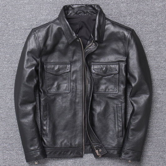 Black leather jacket on a textured gray background