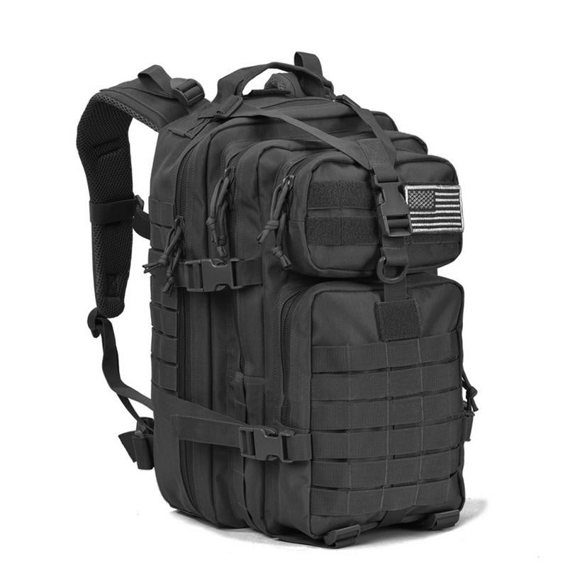 Black tactical backpack with American flag patch on a white background