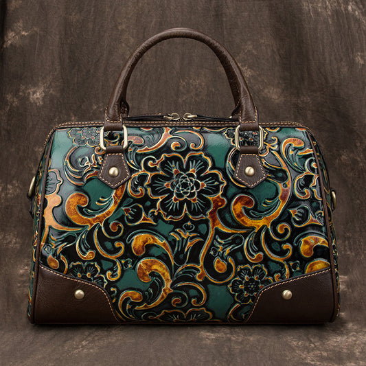 Decorative handbag with floral patterns on a textured brown background