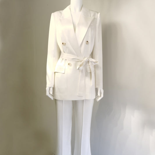 White suit on a mannequin against a plain background by millivan
