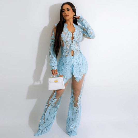 Woman wearing a light blue lace outfit against a white background