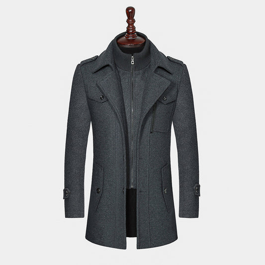 Gray coat on a mannequin against a white background