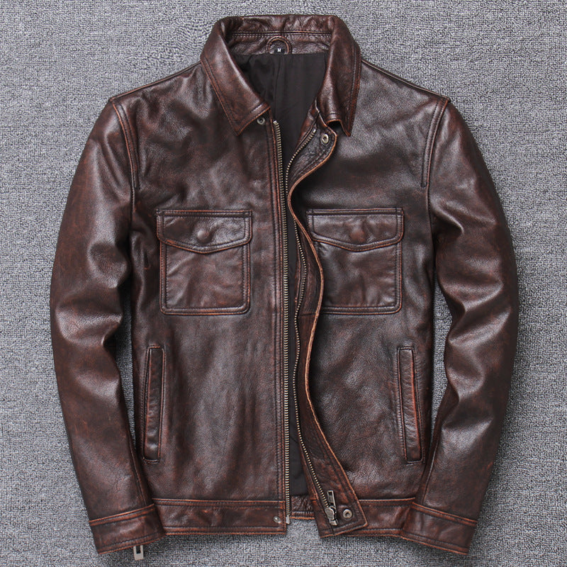 Brown leather jacket on a gray textured background