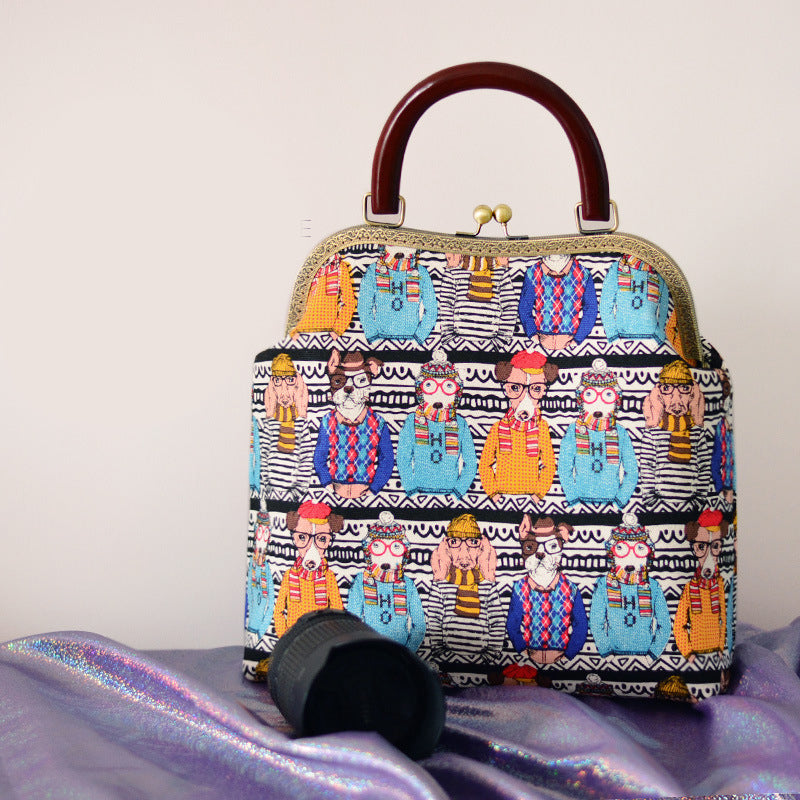 Colorful handbag with a pattern of cartoon characters on a white background