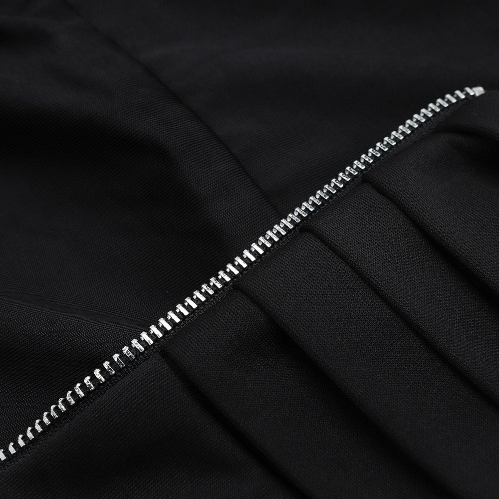 Close-up of a black jacket with a silver zipper