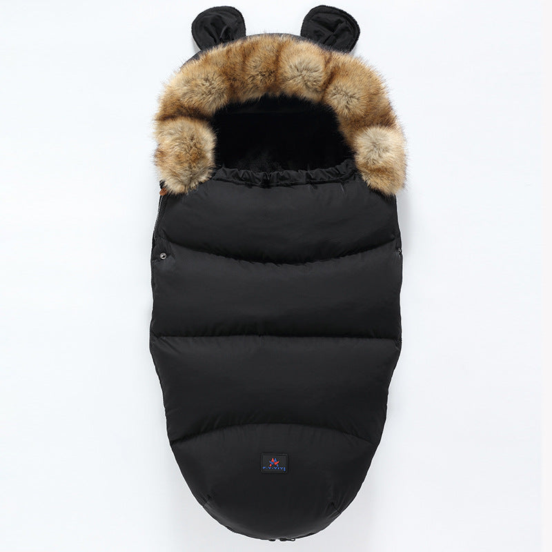 Black baby sleeping bag with fur hood on a white background