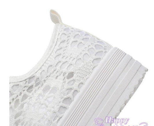 White lace-up sneaker on a white background with 'Happy' text overlay.