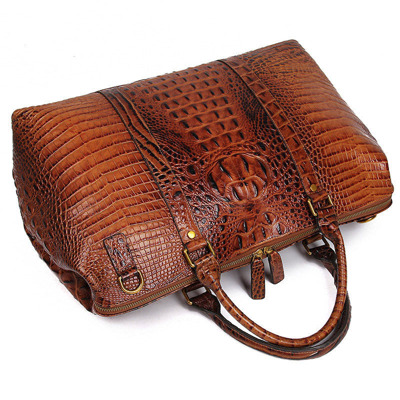 Brown textured handbag on a white background
