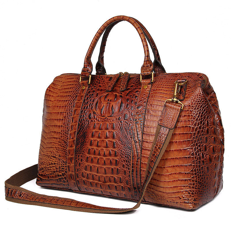 Brown textured handbag with a shoulder strap on a white background