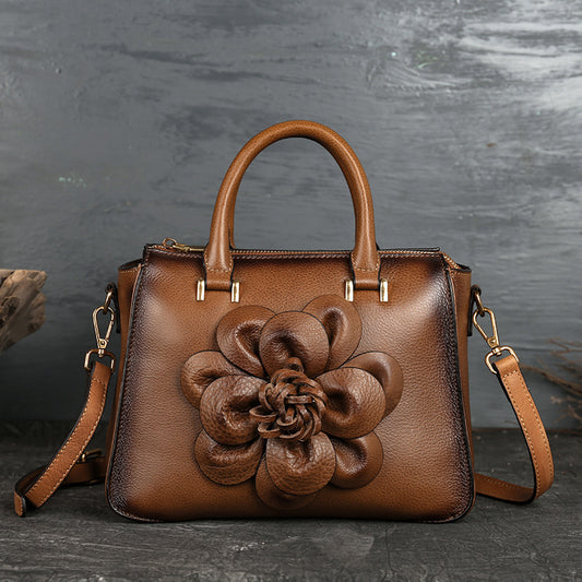 Luxury square leather handbag with floral totem design in [color] - premium women's fashion accessory
