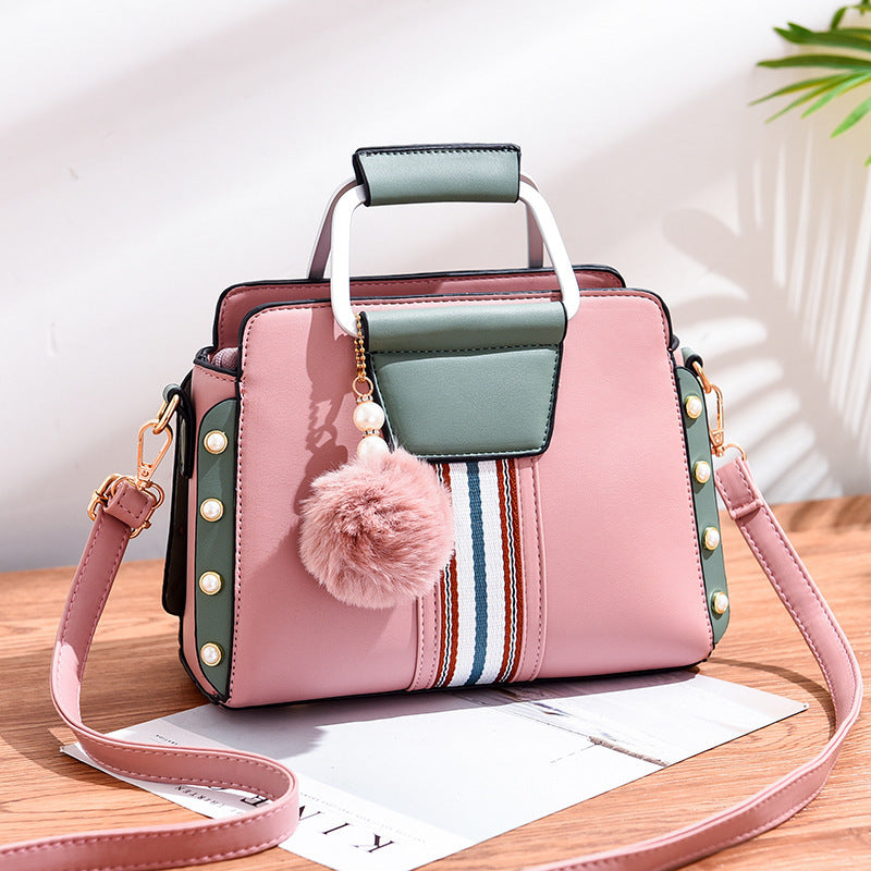 Luxury fashion handbag for women in [color] - stylish, durable designer bag with multiple compartments, adjustable shoulder strap, and water-resistant lining - premium quality polyester handbag - Millivan Supplies