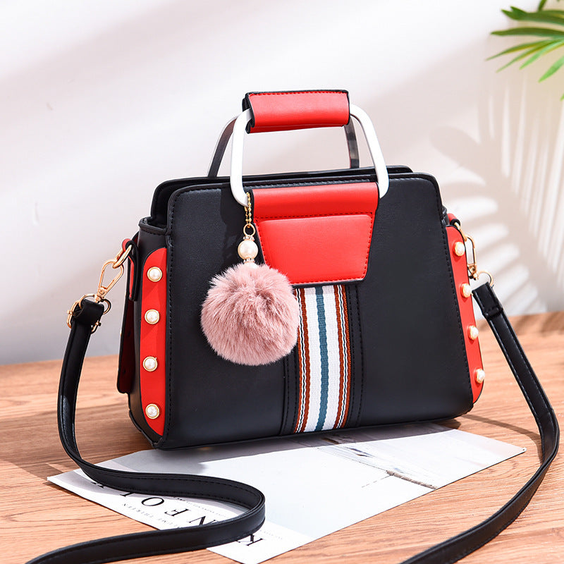 Luxury fashion handbag for women in [color] - stylish, durable designer bag with multiple compartments, adjustable shoulder strap, and water-resistant lining - premium quality polyester handbag - Millivan Supplies