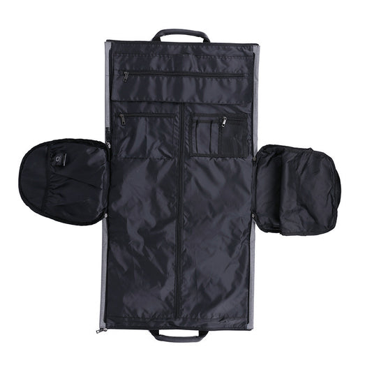 Black travel bag with compartments on a white background
