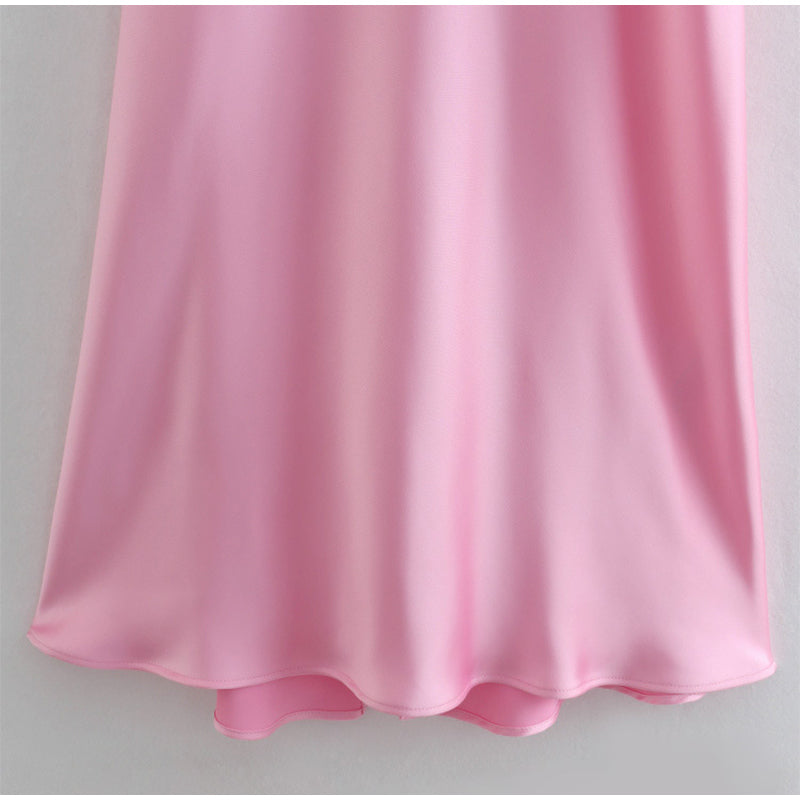 Pink fabric on a gray background by millivan