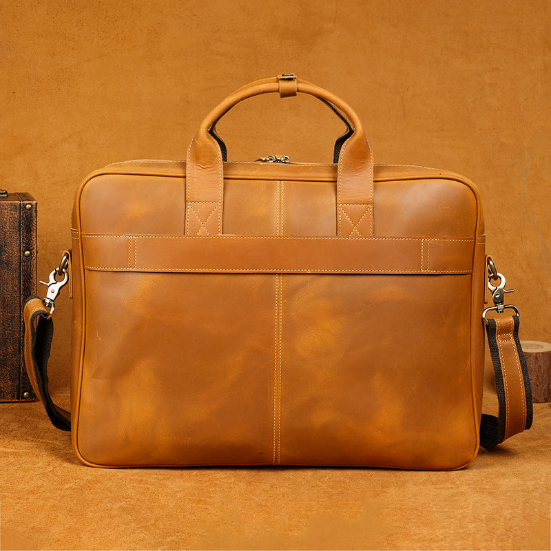 Brown leather briefcase on a matching brown background
