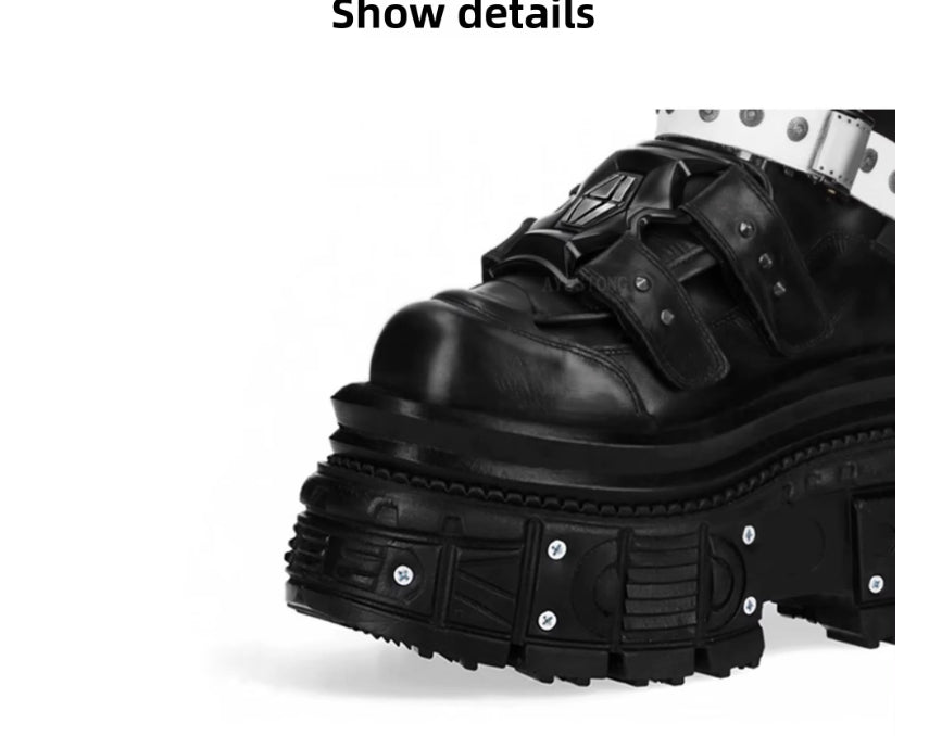 Black leather boot with thick sole on a white background