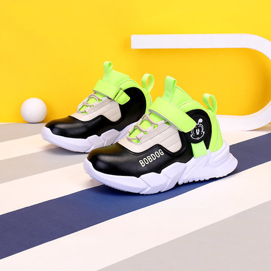 Black and neon green sneakers with 'BOBDOG' branding on a yellow and blue striped background.