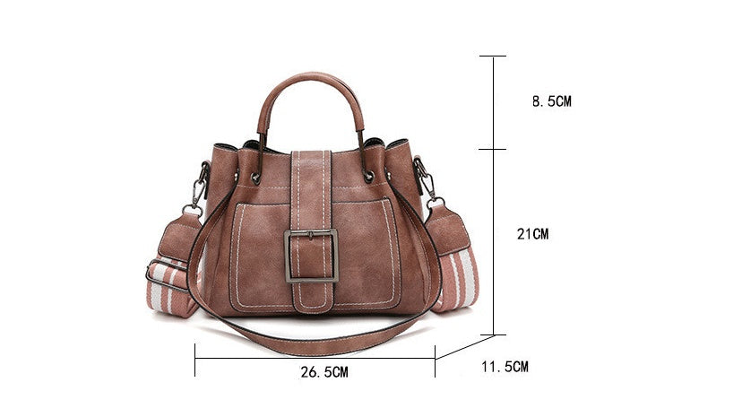 Brown handbag with measurements on a white background