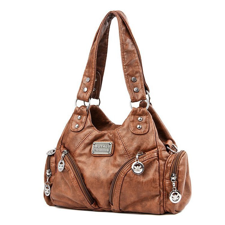 Brown leather handbag with silver accents on a white background