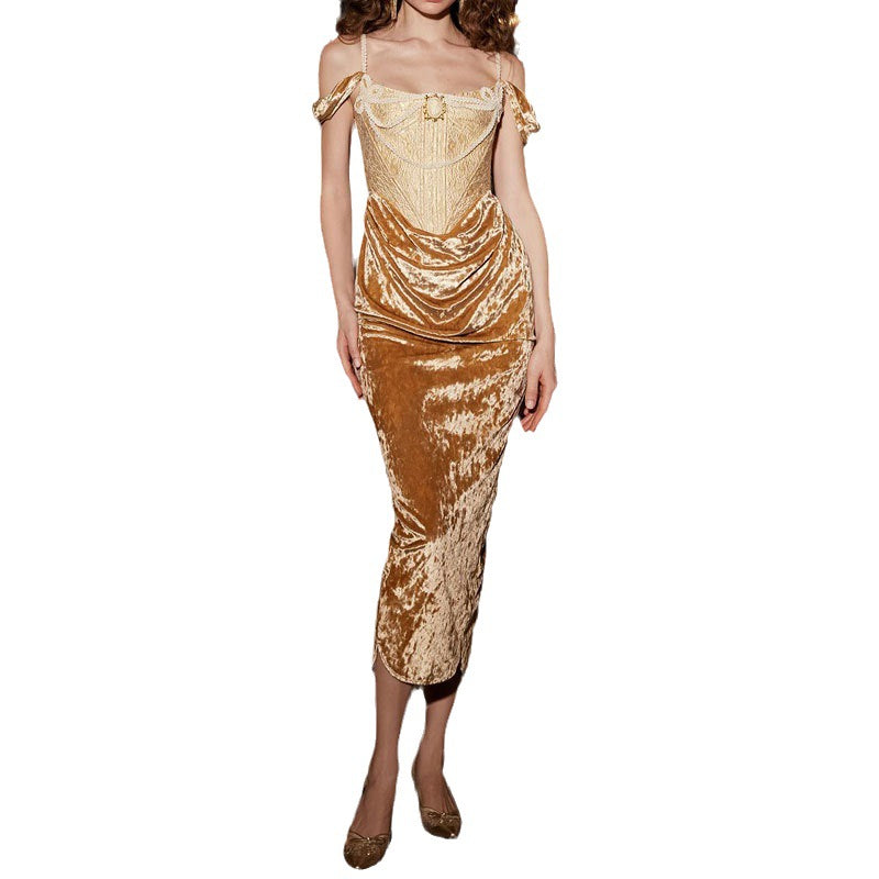 Gold sequin dress worn by a model on a white background