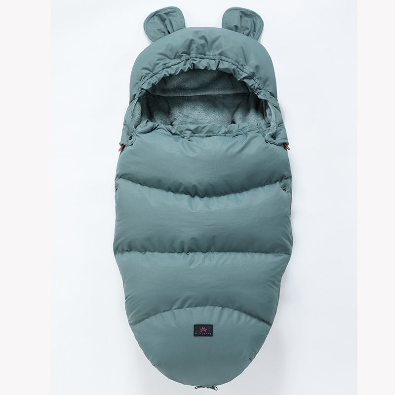 Teal baby sleeping bag with bear ears on a white background