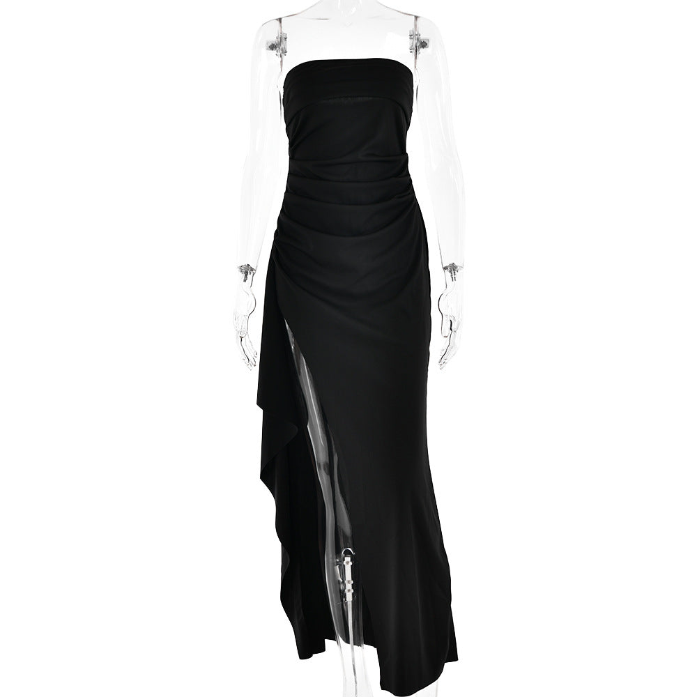 Black strapless gown on a mannequin with a white background