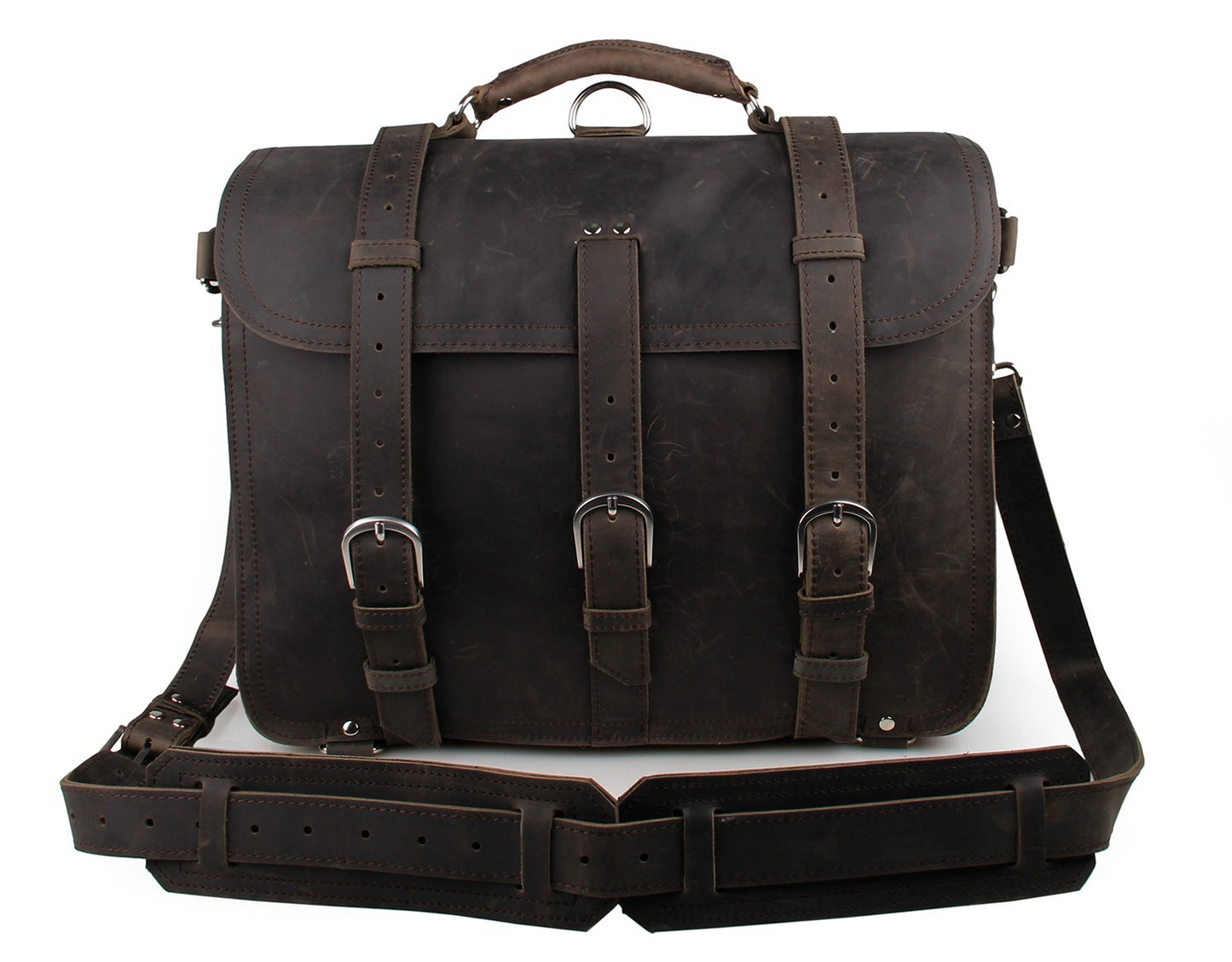 Brown leather briefcase with straps and a handle on a white background