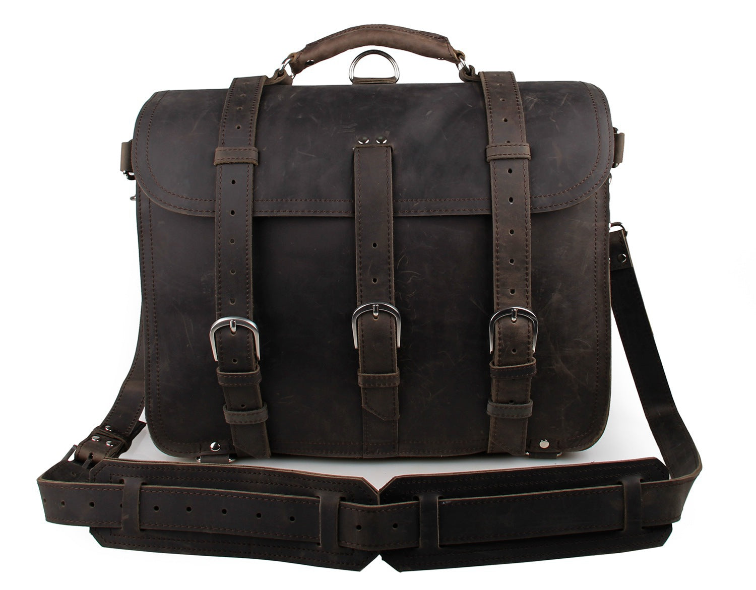 Brown leather briefcase with straps and a handle on a white background