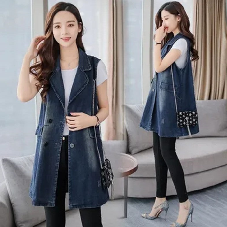 Woman wearing a denim vest in a living room setting
