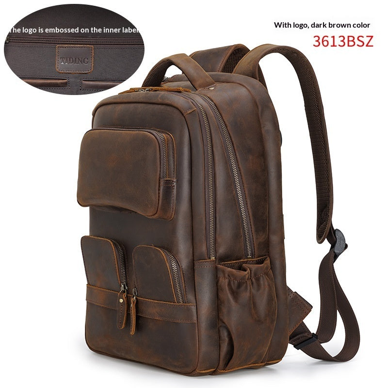 Brown leather backpack with multiple pockets and a visible brand logo on a white background.