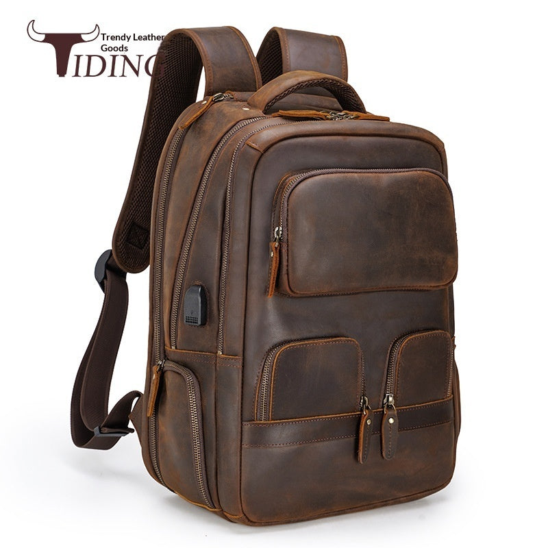 Brown leather backpack with multiple pockets on a white background, featuring the brand 'TIDING'.