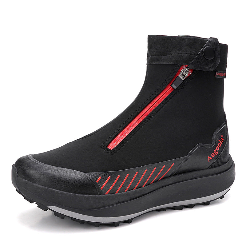Black ankle boot with red zipper and accents on a white background