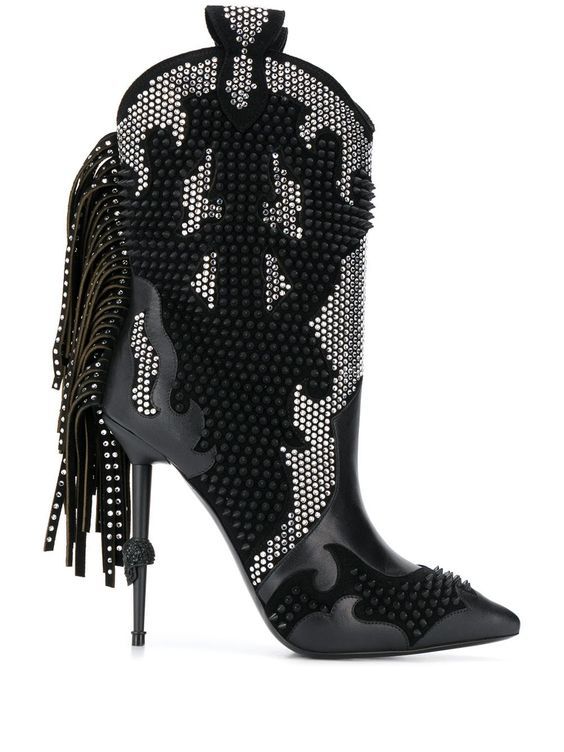 Black studded high-heeled boots with fringe on a white background