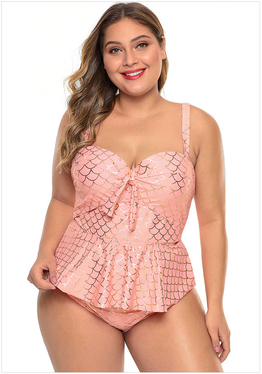 Woman wearing a pink sequin swimsuit on a white background