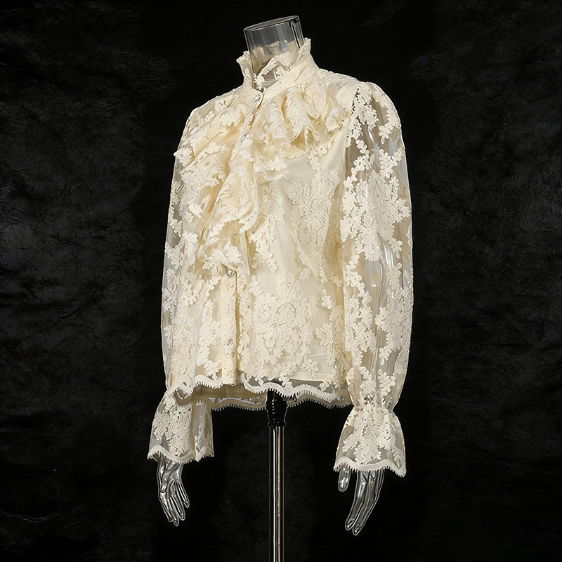 White lace blouse on a black background