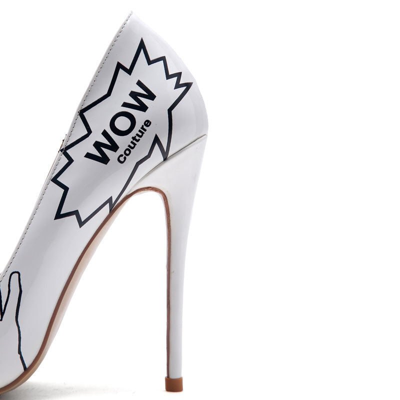 White high-heeled shoe with 'WOW Couture' design on a white background