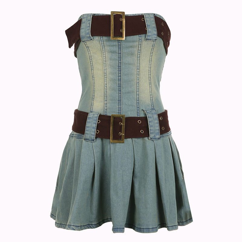 Denim dress with brown belt and gold buckles on a white background